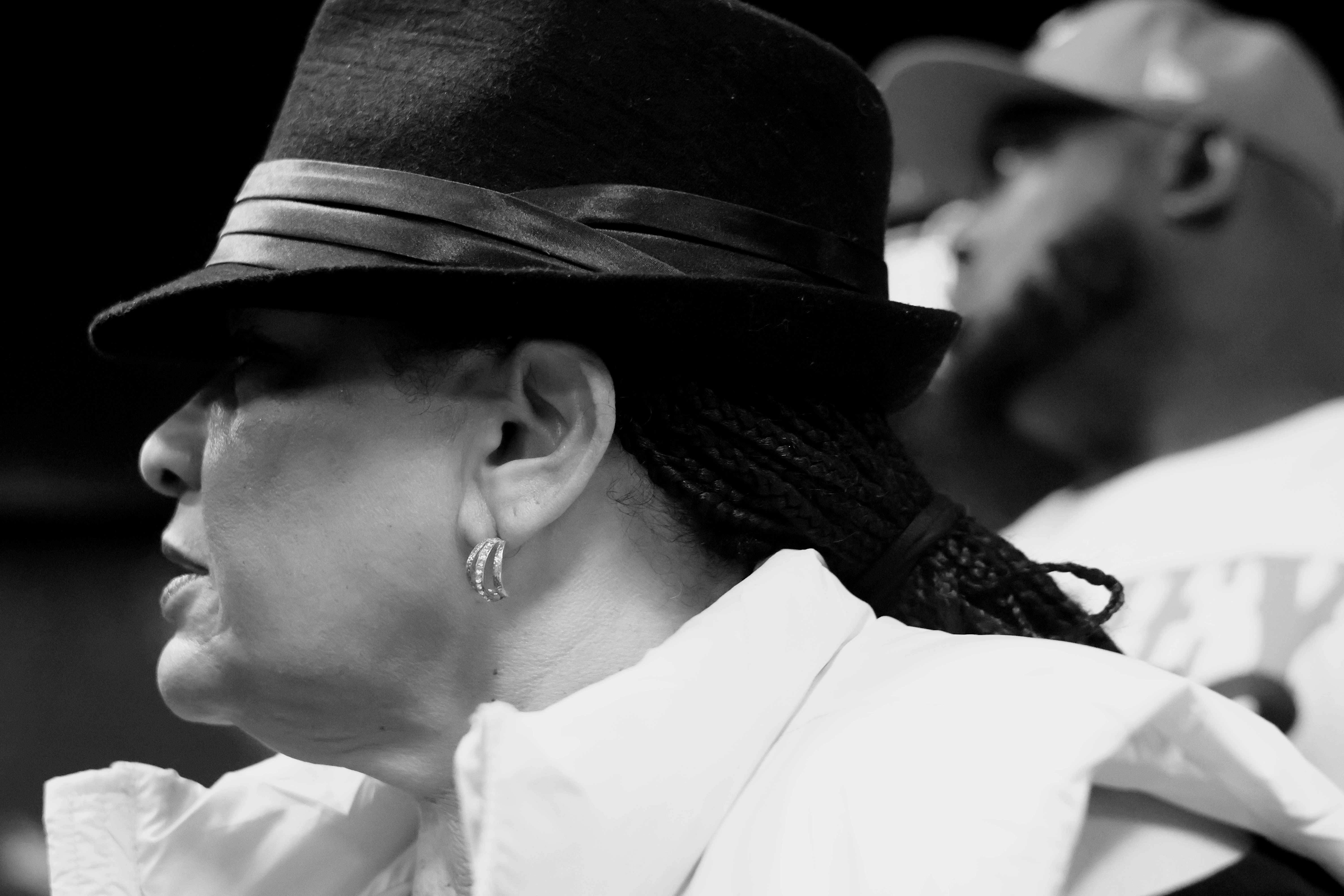 Cinematic portrait - woman in fedora, B&W